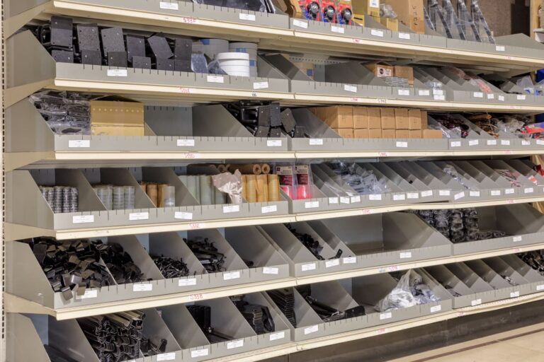 Gray shelf bins filled